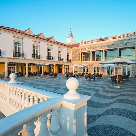 Praia D'El Rey Marriott Golf & Beach Resort Praia del Rei Exterior photo The central courtyard of the hotel